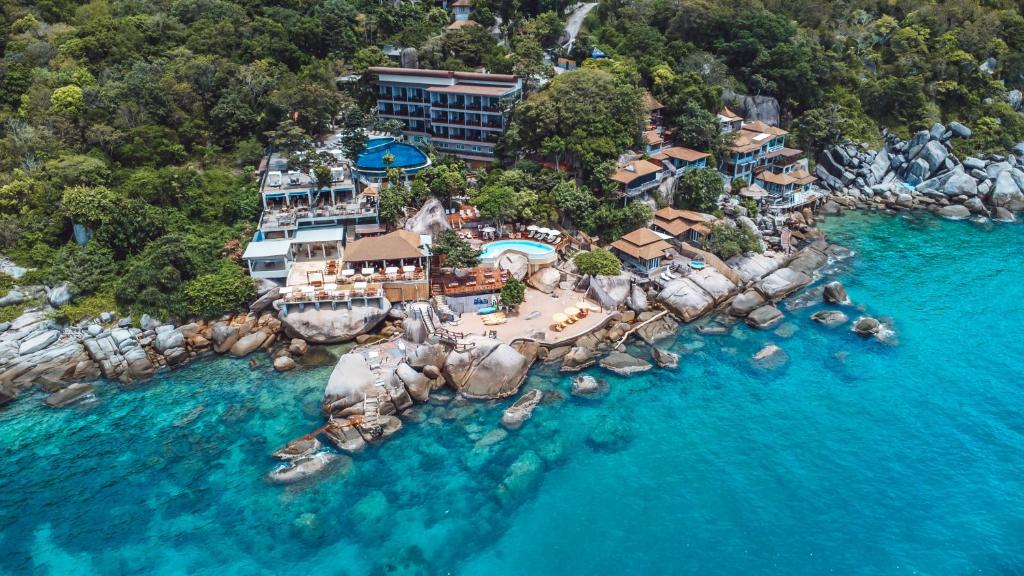 an aerial view of a resort in the water at Dusit Buncha Koh Tao by Riya Group in Ko Tao