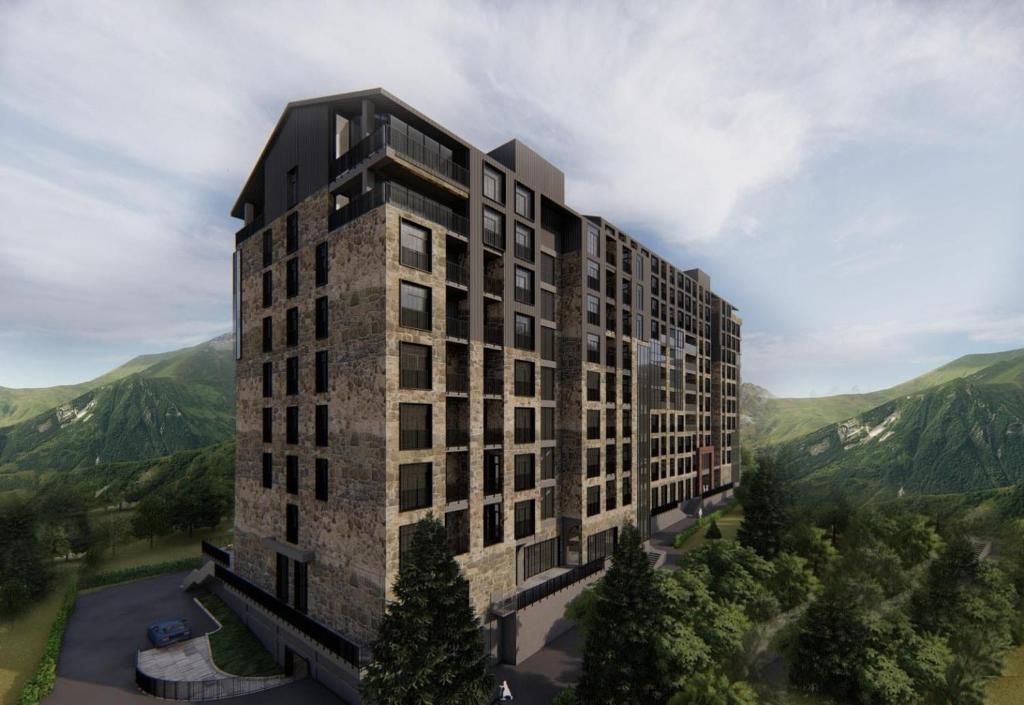 a rendering of a building with mountains in the background at Kechi House Jaklin in Tsaghkadzor