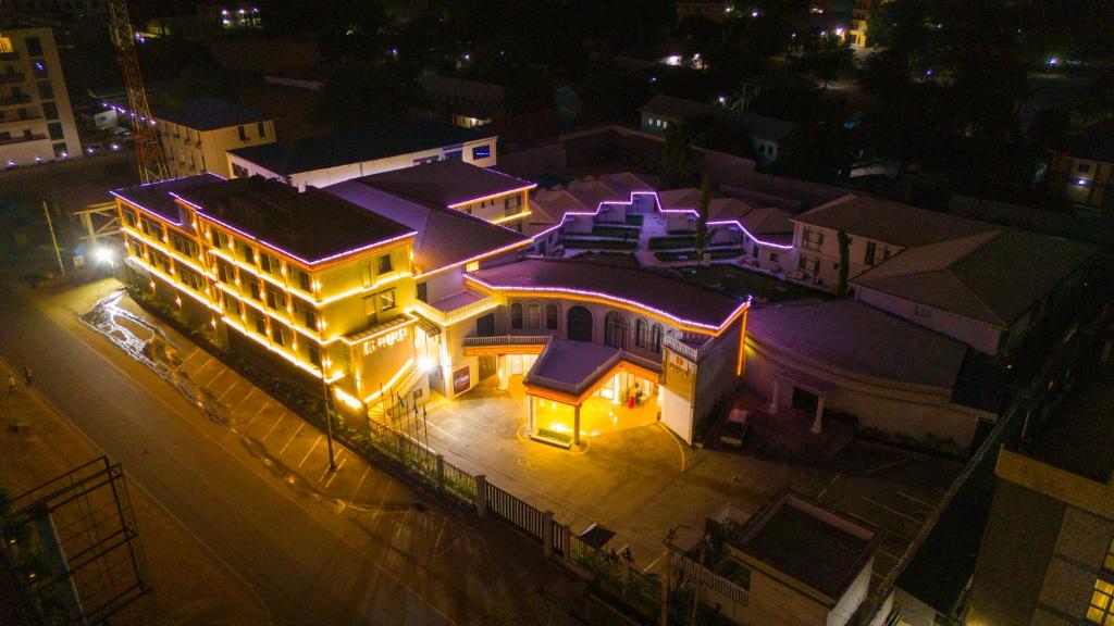 an overhead view of a building at night at Dembesh Hotel Juba in Juba