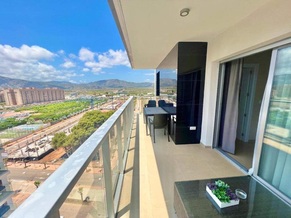 a balcony with a view of a city at CJ186 - Ciudad Jardin I, Prime - ServHouse in El Borseral