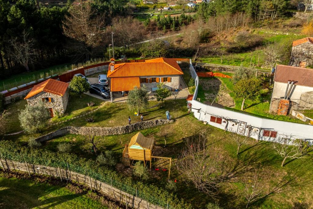 an aerial view of a house with a train yard at Taloca Do Grilo in Baião