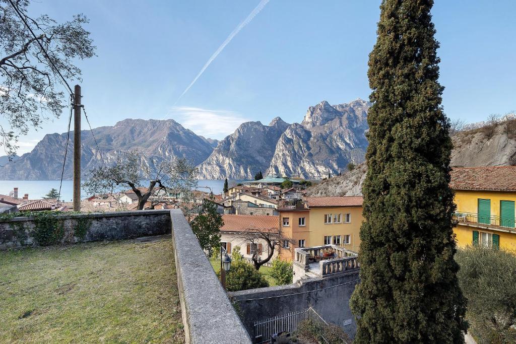 a view of a town with mountains in the background at Villa G By Immobilux in Nago-Torbole