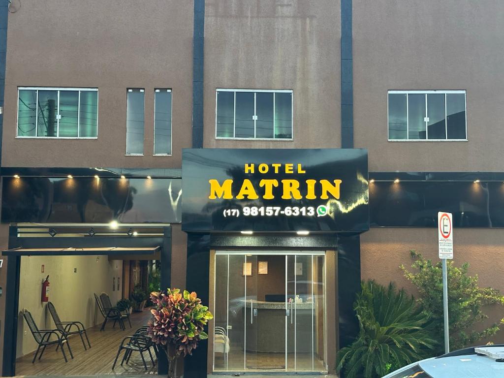 a hotel marlin sign on the front of a building at Hotel Matrin in Barretos