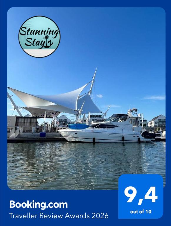 a picture of a marina with boats in the water at Stunning Stayz Luxury 2 King Suite at Friday Harbour Resort Marina Walk & Parking in Innisfil