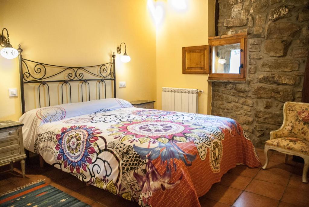 Postel nebo postele na pokoji v ubytování El Mijolar Apartamentos