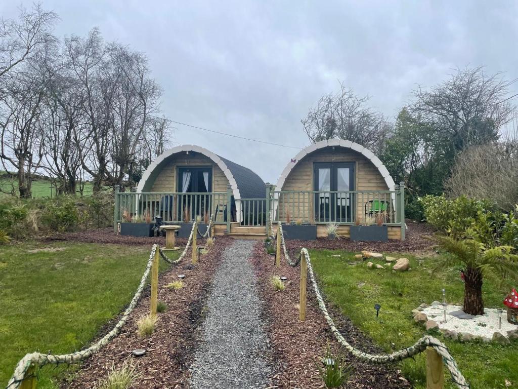two domes in a garden with a path leading to it at Mountain View in Tipperary