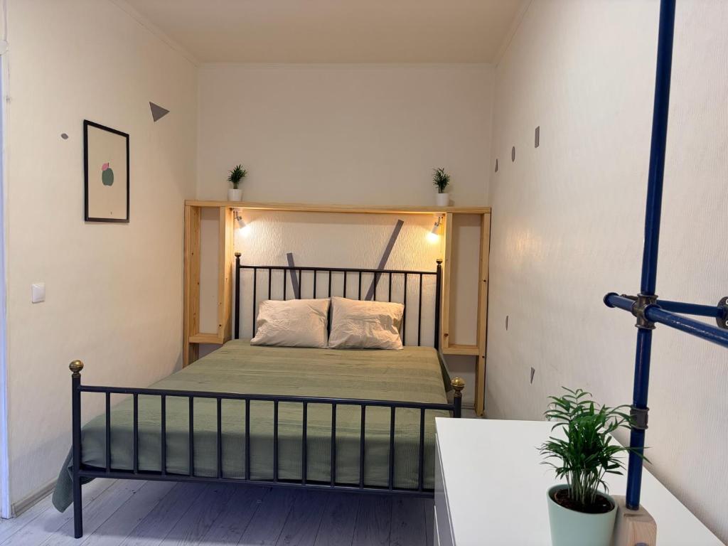 a bedroom with a bed in a room at Nice apartment close to the beach in Tallinn