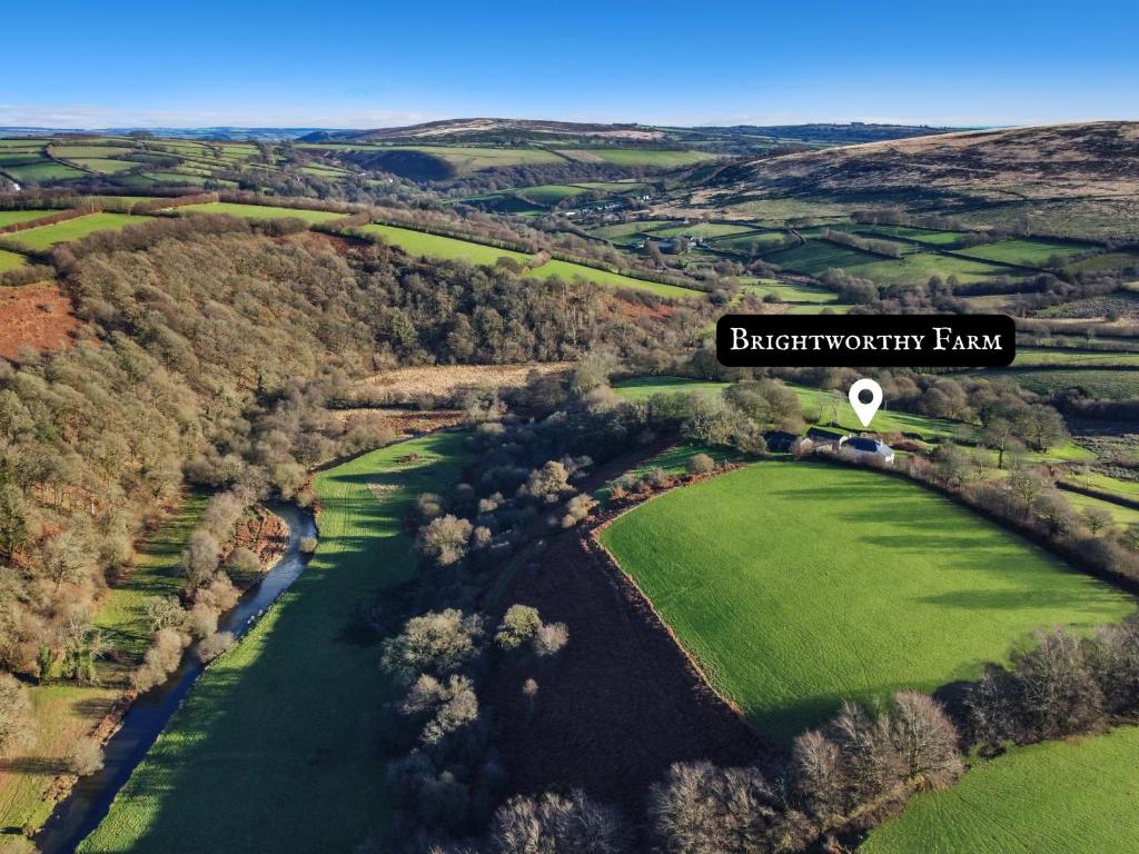 an aerial view of a golf course with the words backstromopers farm at Brightworthy Farm Withypool in Withypool