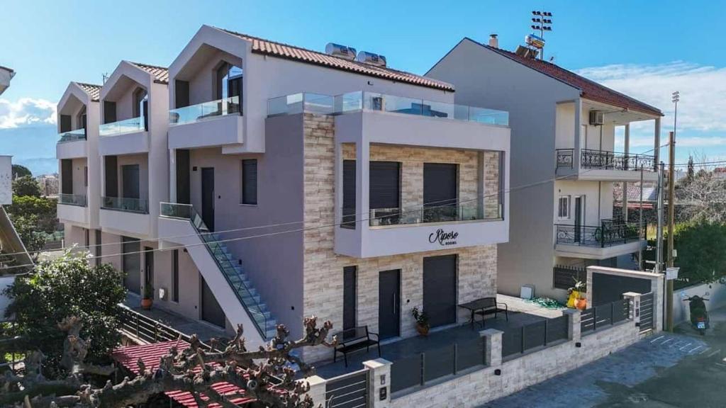 a rendering of a house with a balcony at RiposoRooms in Nafpaktos