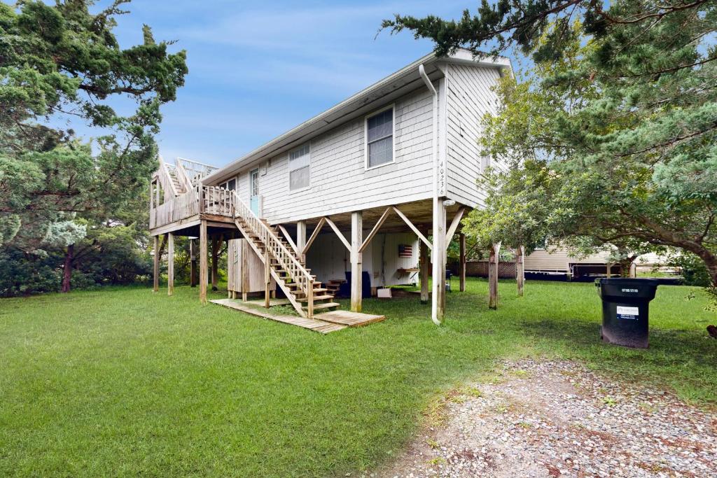a large house with a porch and a staircase on it at AV054 Blue Dolphin in Avon