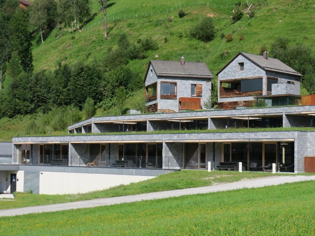 a house on top of a hill at Smaragdresort Gipfelstürmer in Brandberg