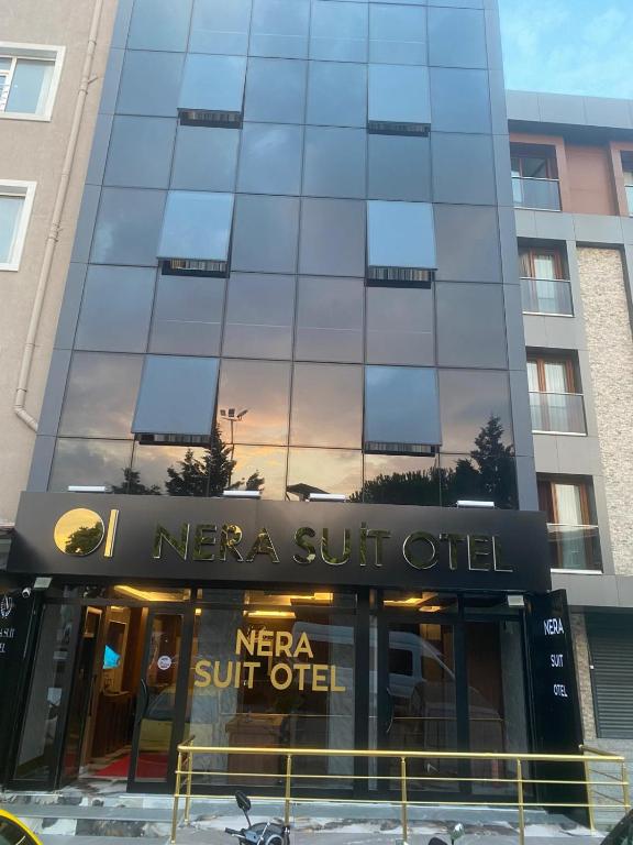 a building with a sign on the front of it at Nera Otel in Istanbul