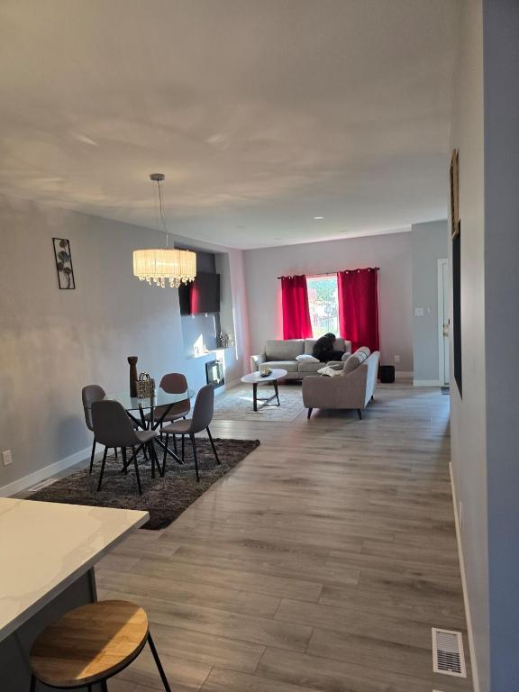 a living room with a couch and a table at The Lots home in Winnipeg