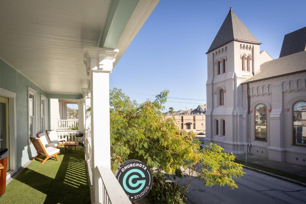 a view of a building with a clock tower at Church GTX in Galveston