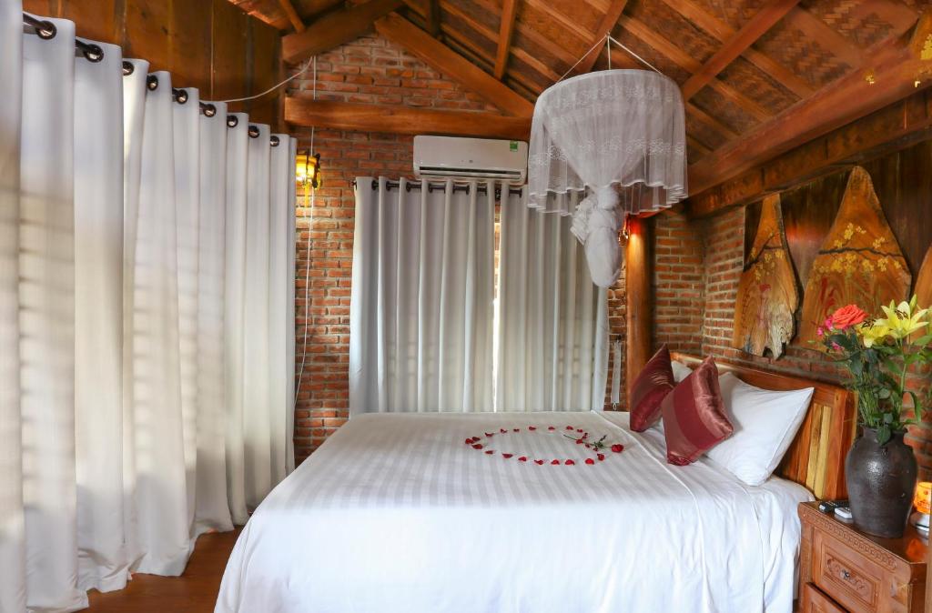 Postel nebo postele na pokoji v ubytování Seaside An Bang Homestay