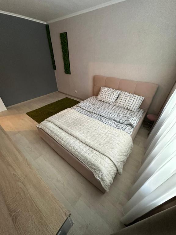 a bedroom with two beds in a room at Квартира на Перемоги in Lutsk