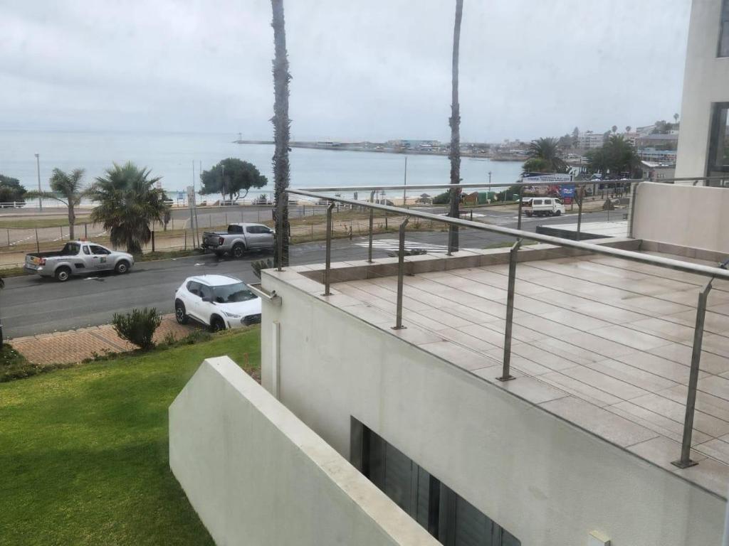 a view of a parking lot from a building at 13 at Santos in Mossel Bay