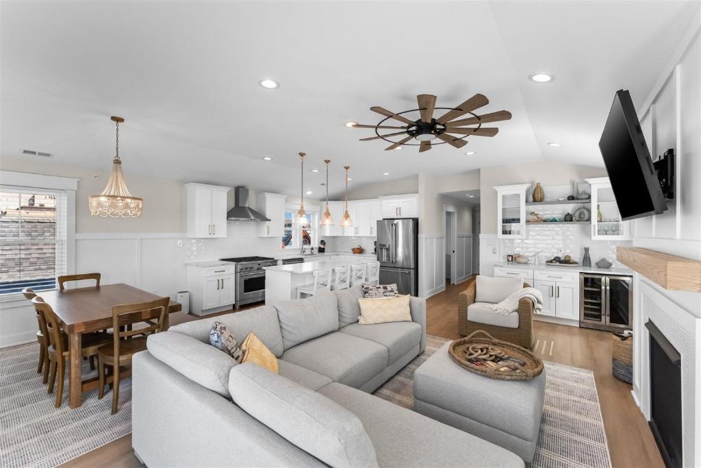 a living room and kitchen with a couch and a table at 921 Asbury Ave, Unit C in Ocean City