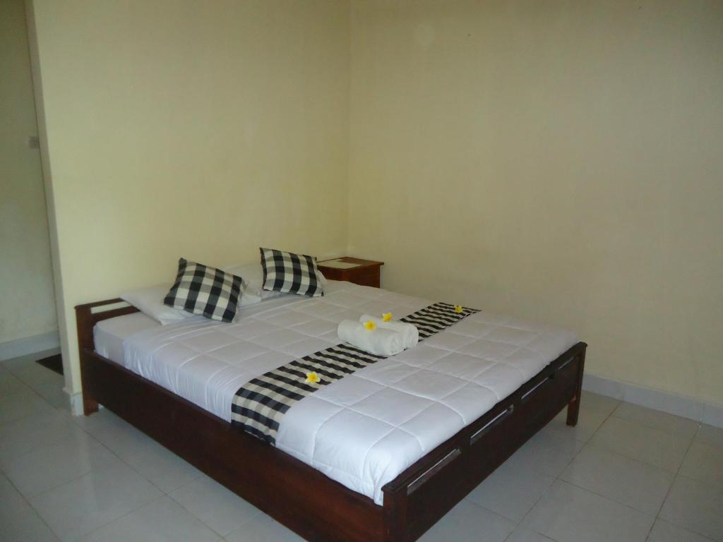 Кровать или кровати в номере Nataliya Homestay