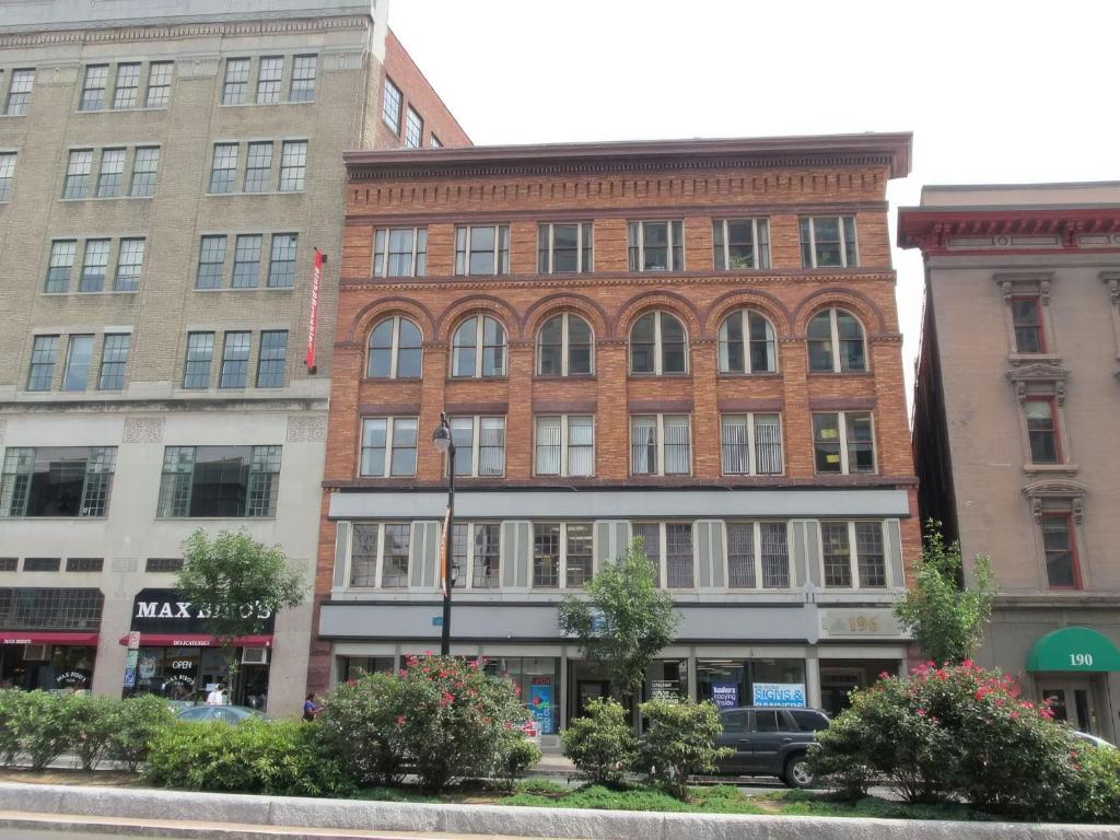 a group of buildings on a city street at Trumbull Apartments Elevator WI-FI XL CENTER Hartford CT in Hartford