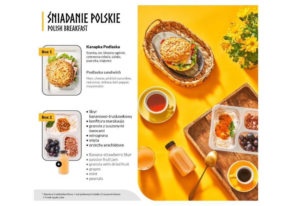 Polish breakfast menu layout showing a sandwich, yogurt box, grapes, tea and juice.