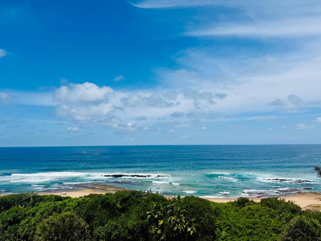 a view of a beach with the ocean at Deja Blue in Westbrook