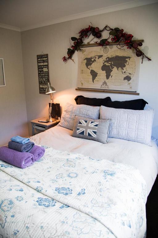 Postel nebo postele na pokoji v ubytování Waitomo Orchard Estate B&B