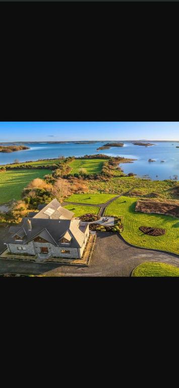 an aerial view of a building on a golf course at Birchall Lodge in Galway