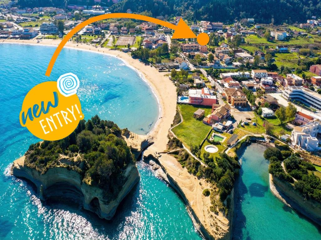 an aerial view of a beach with an orange arrow at Villa Sunray Sidari with private pool by DadoVillas in Sidari