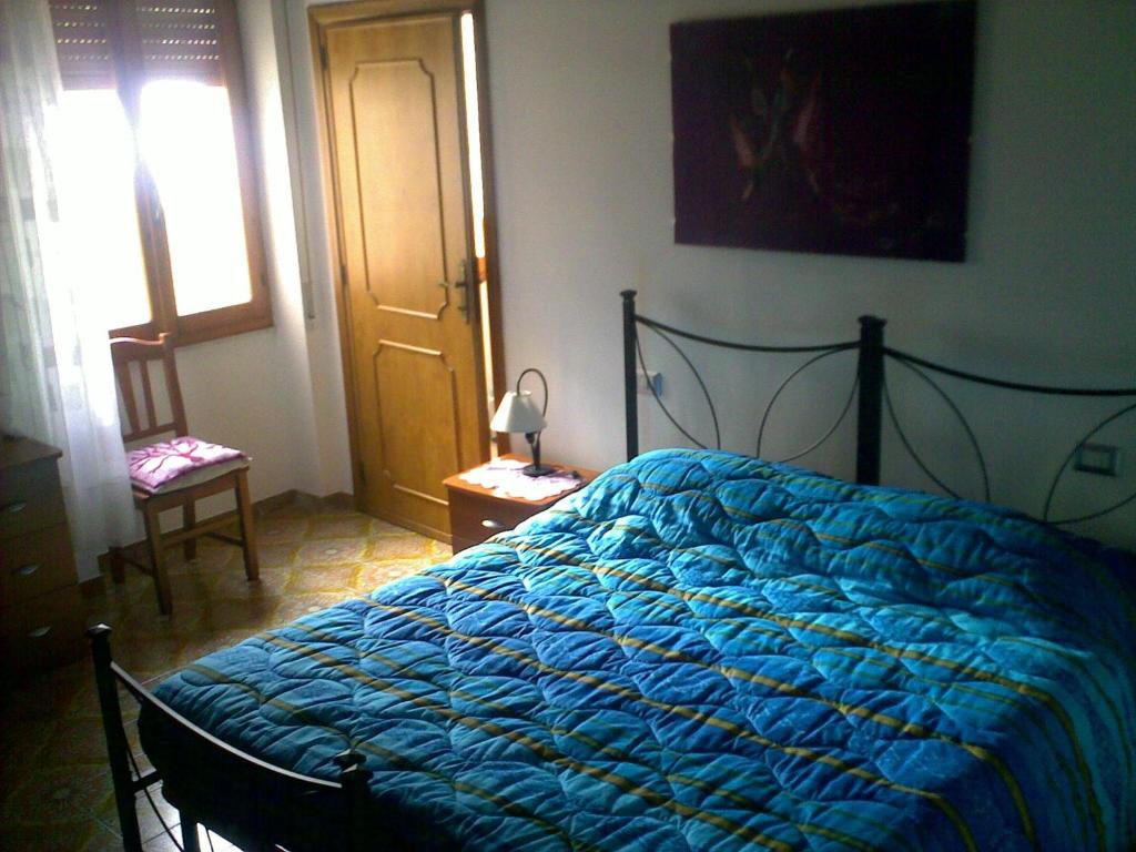 Postel nebo postele na pokoji v ubytování B&B Sea And Sardinia