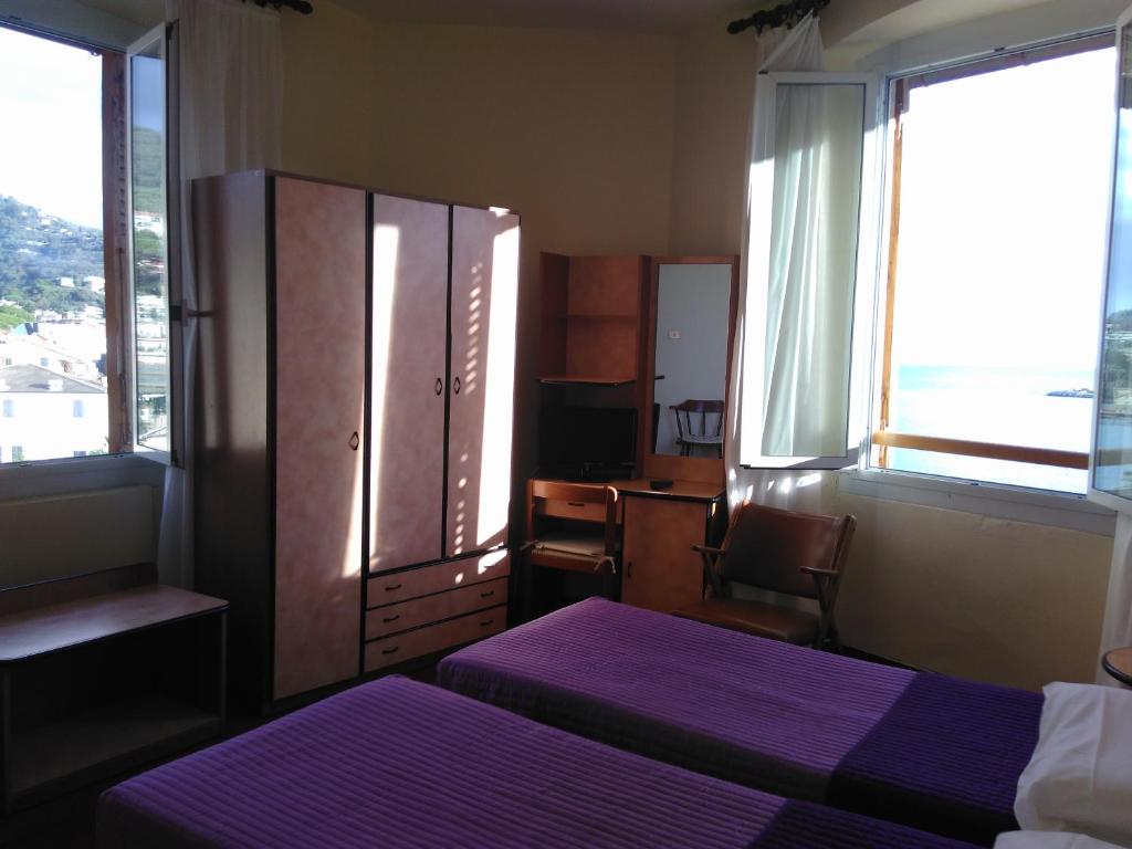 Postel nebo postele na pokoji v ubytování Albergo Bandoni