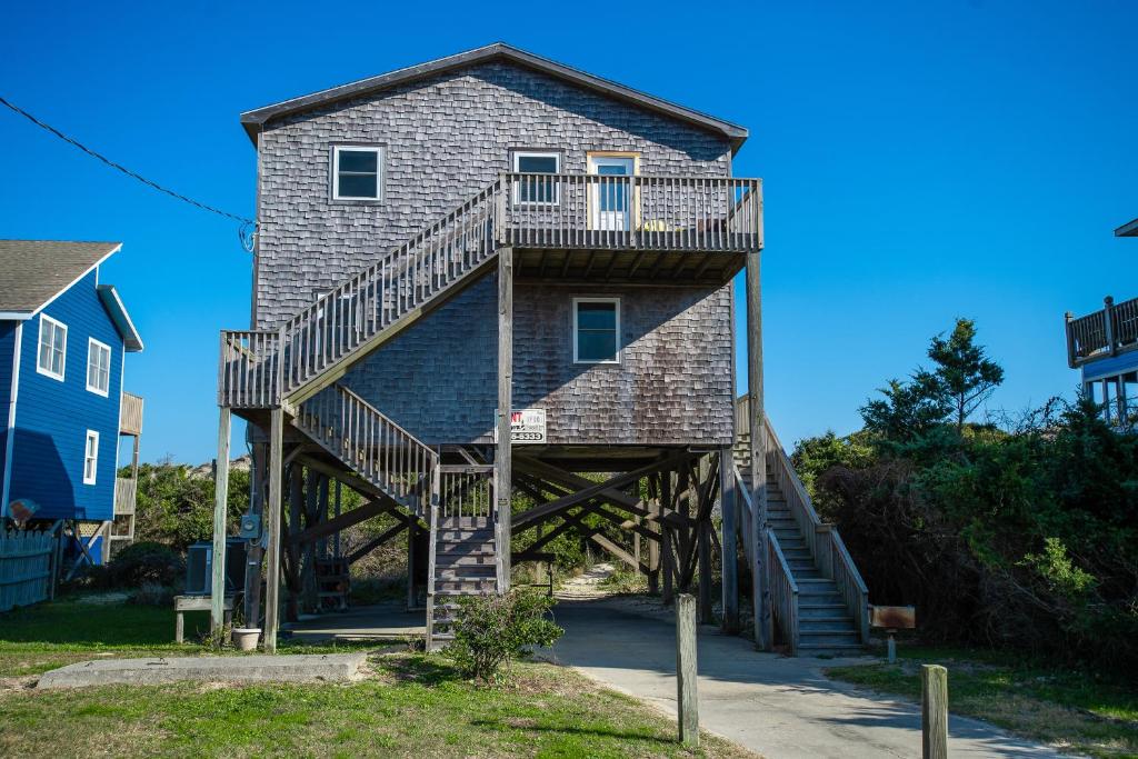 a house with a staircase on the side of it at AVWI1 Beach Stars #1-WI in Avon