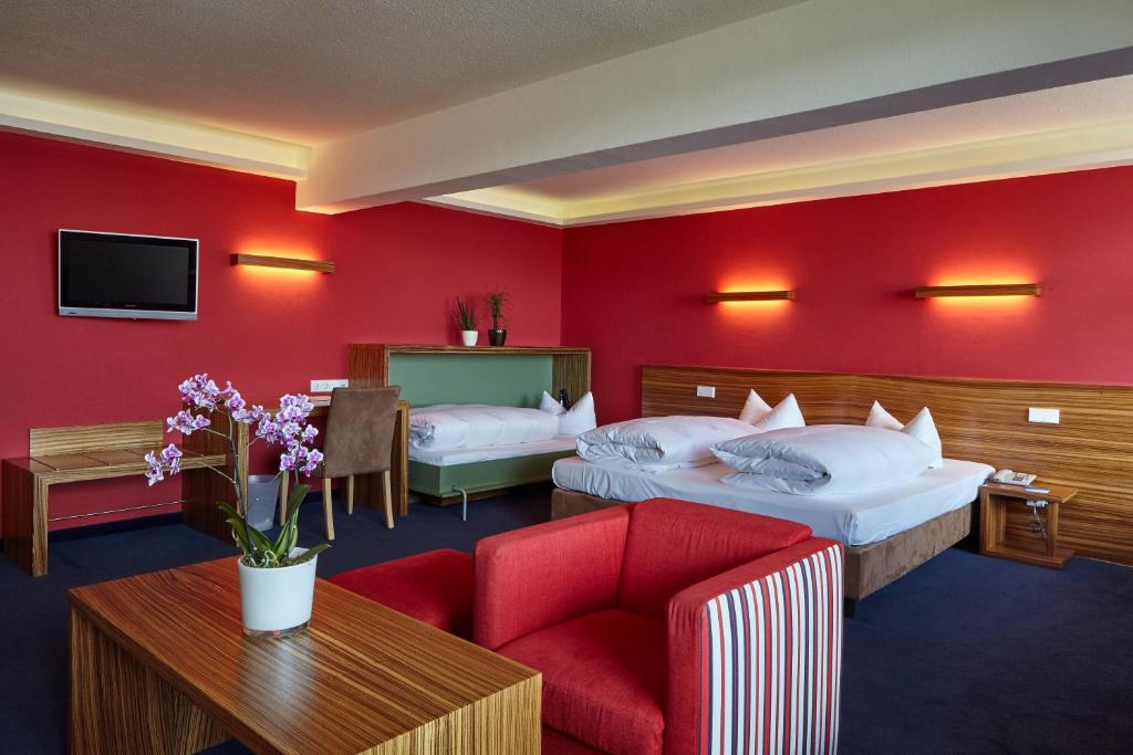 Postel nebo postele na pokoji v ubytování Hotel Schloss Berg