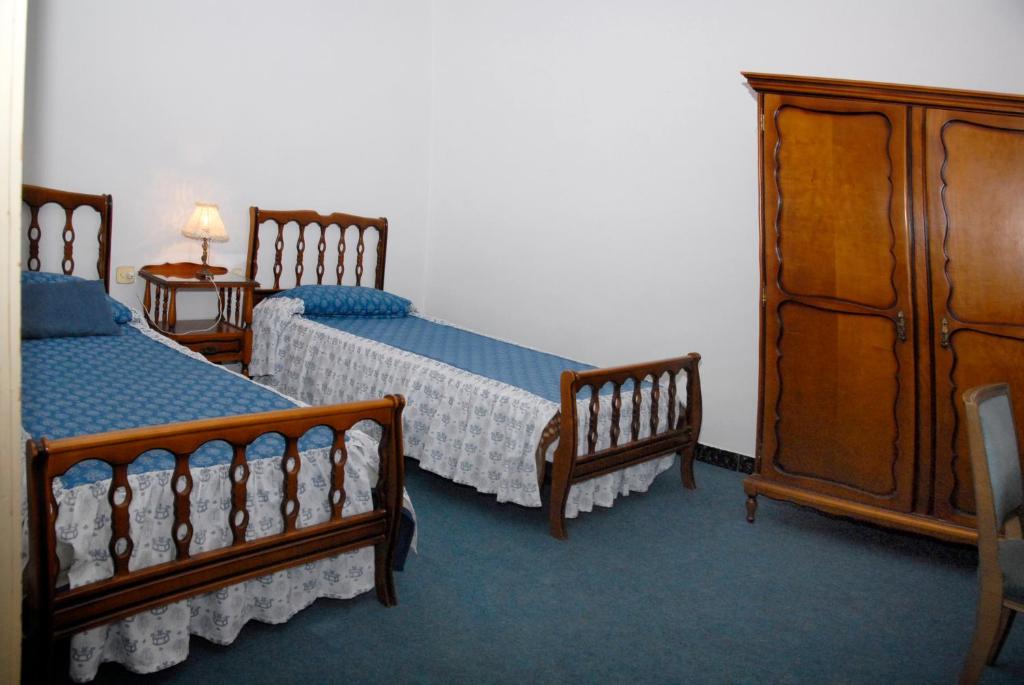 Postel nebo postele na pokoji v ubytování Ca la Paula