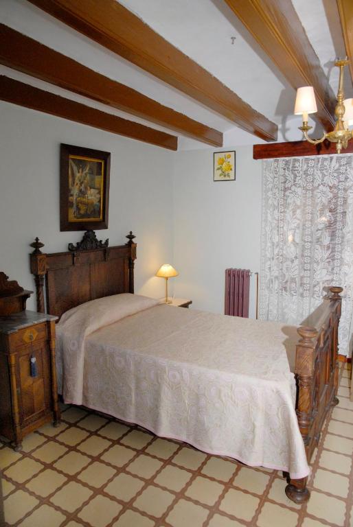 Postel nebo postele na pokoji v ubytování Ca la Paula