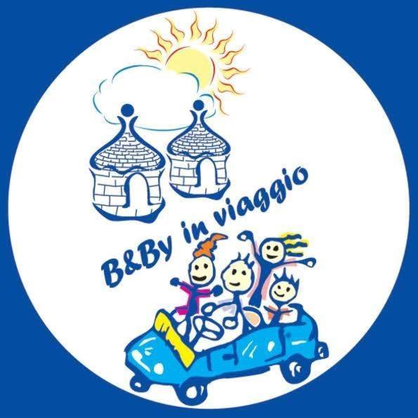 a sticker with a group of people riding a car at B&By in viaggio in Putignano