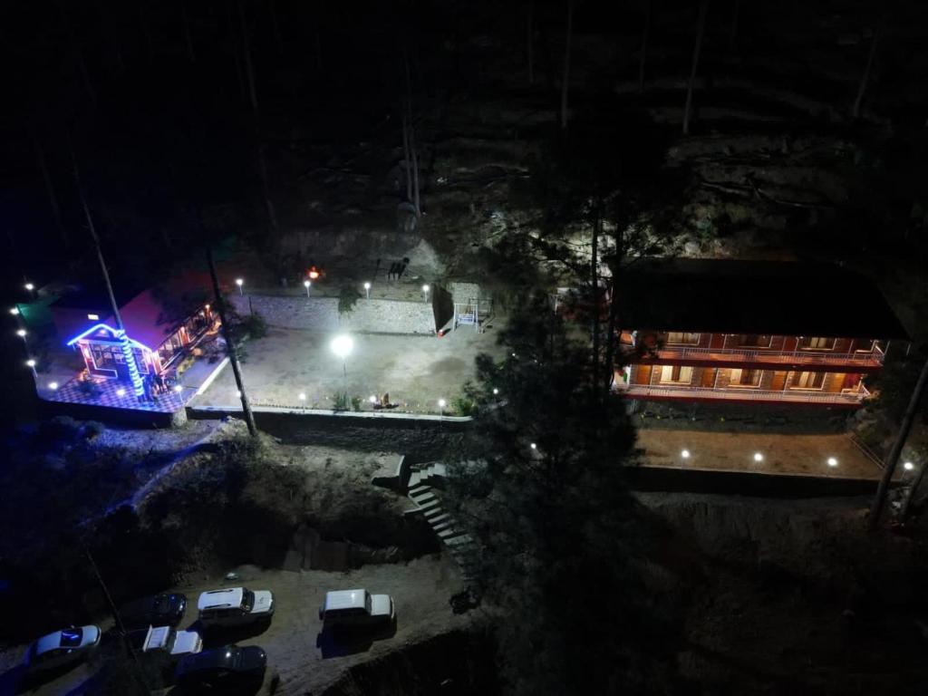an overhead view of a concert at night at Hidden Mountain Resort in Almora
