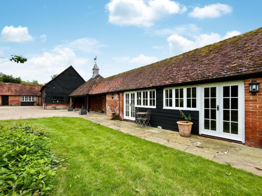 an external view of a building with a yard at Cottage 3 - Uk46609 in Broughton