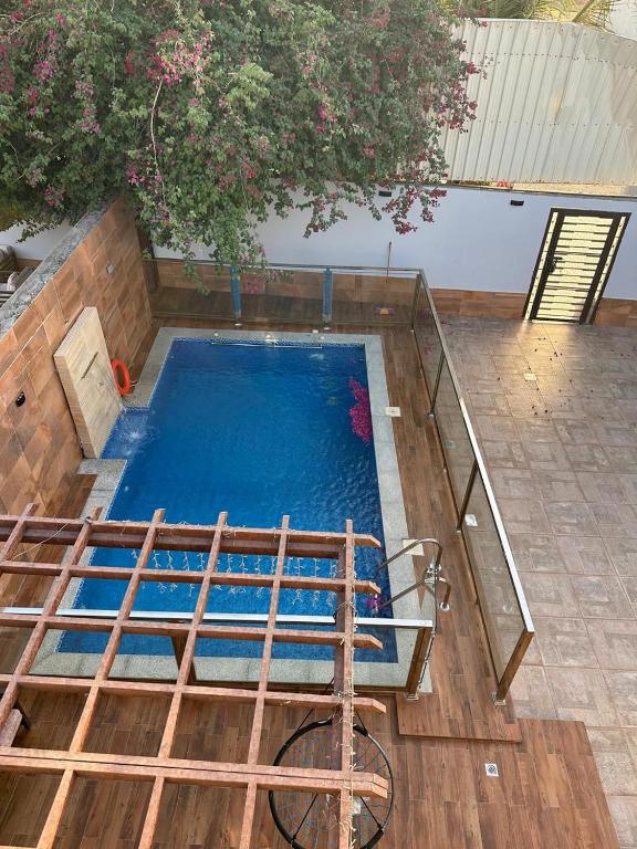 a swimming pool with a fence around it at درة ينبع in Yenbo