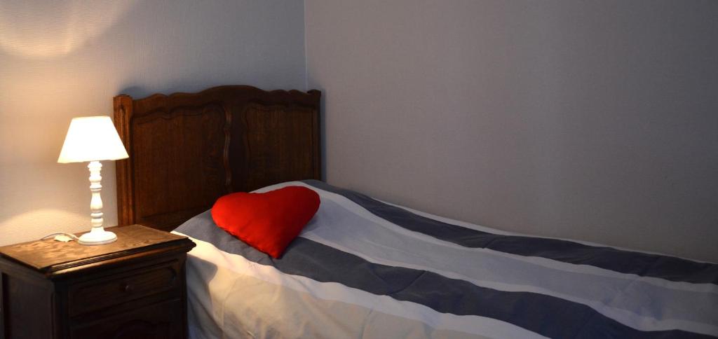 Postel nebo postele na pokoji v ubytování Le Petit Maur
