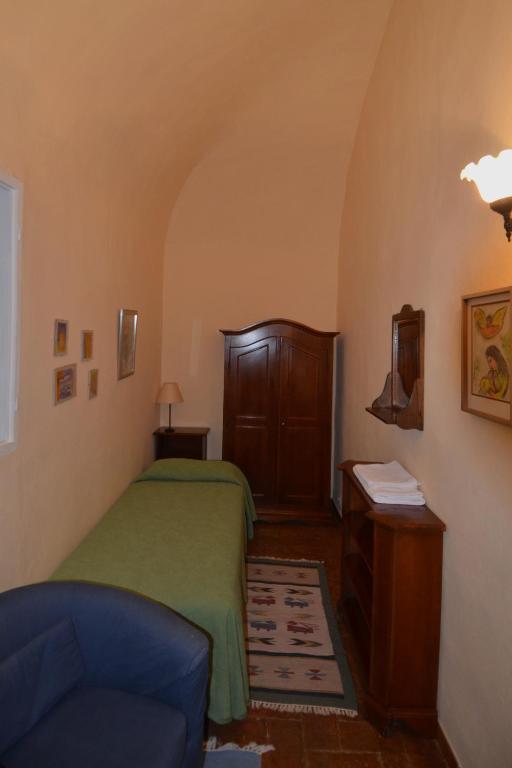 Posteľ alebo postele v izbe v ubytovaní Villa Palagione Centro Interculturale
