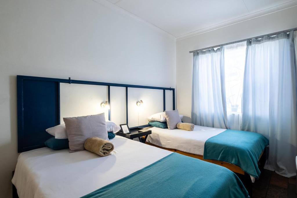 Kate's Nest Guesthouse & Backpackers - Budget Tweepersoonskamer Met 2 Aparte Bedden Of 1 Tweepersoonsbed