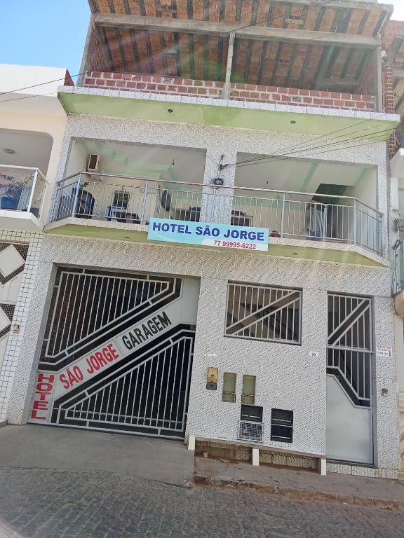 a building with a hotel sao jorge sign on it at Hotel São Jorge in Brumado