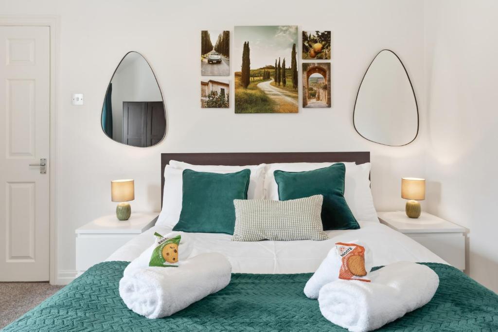 a bedroom with a bed with two pillows at Spacious 1-Bed - Town Centre - Free Parking in Warrington