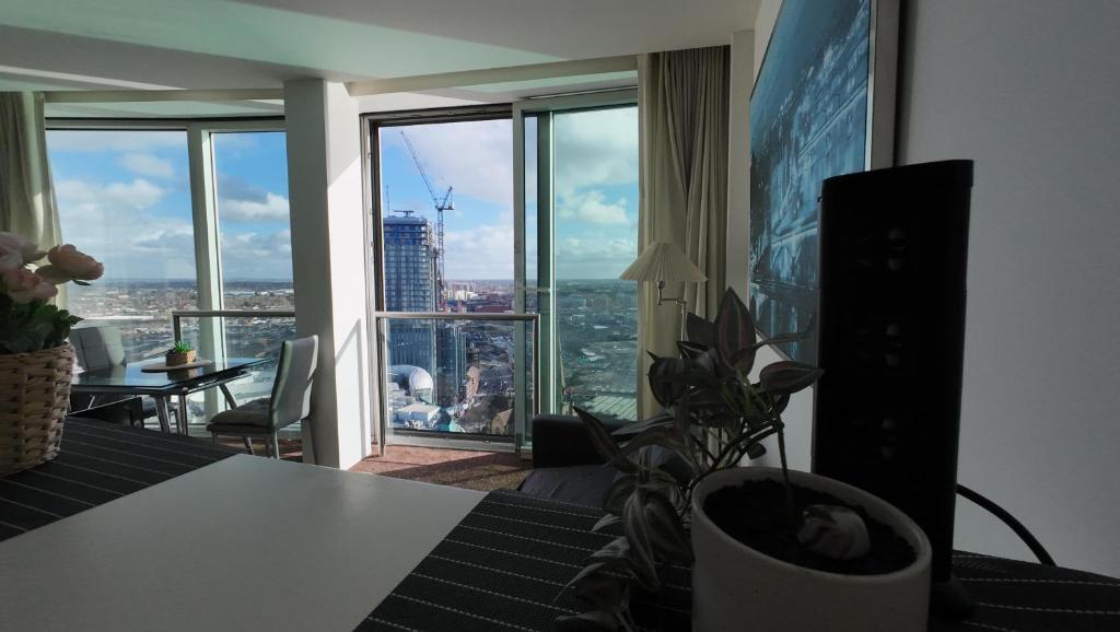 a living room with a view of a building at Nirbhao in Birmingham
