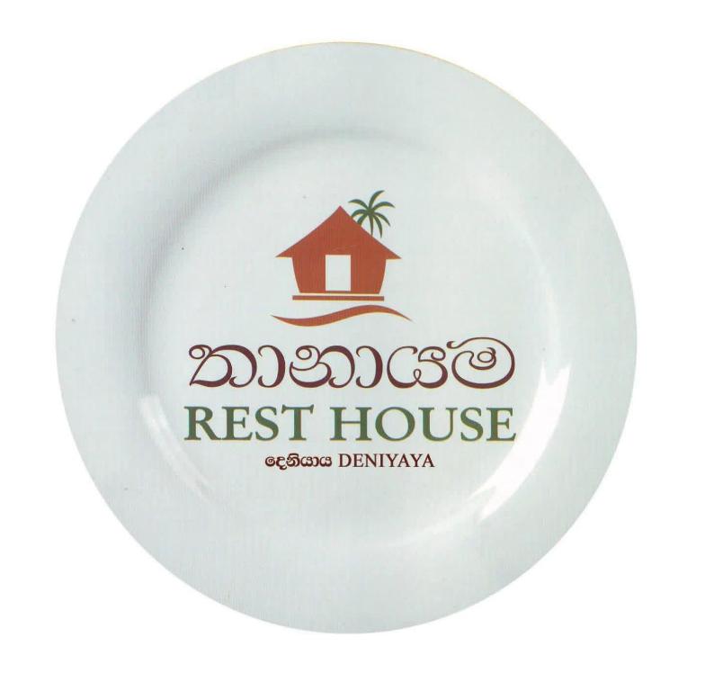 a plate with the logo of a rest house at Thanayama Deniyaya in Deniyaya