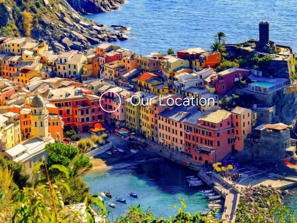 an aerial view of a town next to the ocean at A cà di Bafirussi in Vernazza