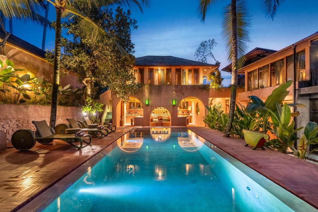 an image of a swimming pool in a house at Moon Gang Ubud in Ubud