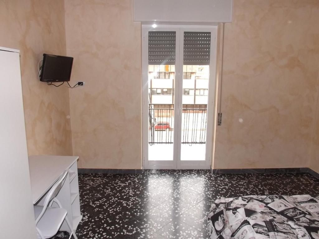 Televízia a/alebo spoločenská miestnosť v ubytovaní Bed And Breakfast Il Subacqueo
