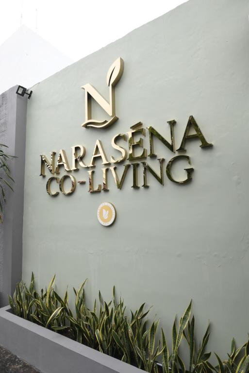 a sign for the la marriott building at Naraséna Co-Living in Yogyakarta